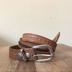 Brown leather belt with silver hardware